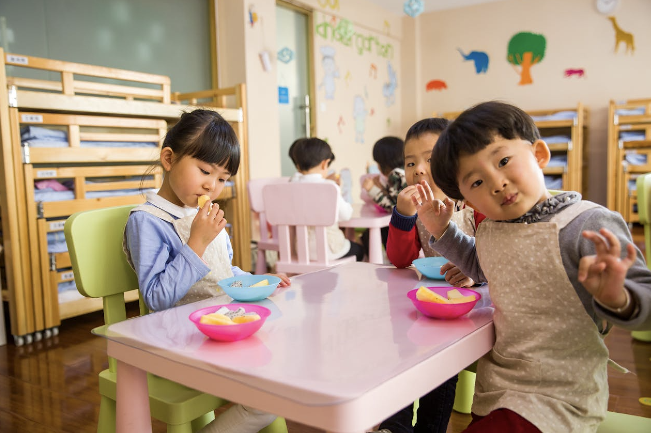 kidzee student eating their snacks in school.